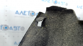 The rear left fender liner of a Toyota Venza 21-24 has torn fasteners.