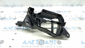 The left underhood fuse box housing for a Toyota Venza 21-24 has a broken mount.