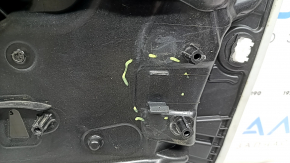 The front left window lift mechanism of a Jeep Renegade 15-23 has broken guides and broken fasteners.