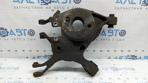 Lower control arm under the rear left spring Lincoln MKZ 17-20 hybrid fwd torn silent block, floating S/B needs replacement