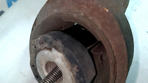 Lower control arm under the rear left spring Lincoln MKZ 17-20 hybrid fwd torn silent block, floating S/B needs replacement