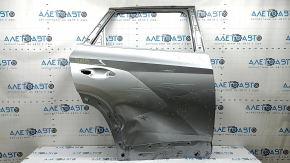 The bare rear right door of a Hyundai Tucson 22-26
