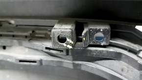 The bare lower rear bumper of the Hyundai Tucson 22-26 without parking sensors.