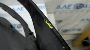 The bare lower rear bumper of the Hyundai Tucson 22-26 without parking sensors.