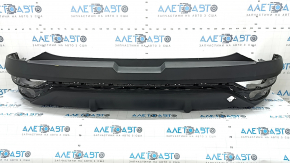 The bare lower rear bumper of the Hyundai Tucson 22-26 without parking sensors.