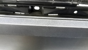 The bare lower rear bumper of the Hyundai Tucson 22-26 without parking sensors.