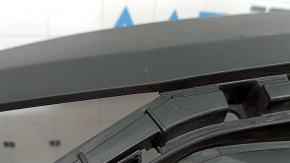 The bare lower rear bumper of the Hyundai Tucson 22-26 without parking sensors.
