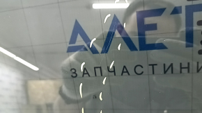 Rear left door glass of Hyundai Tucson 22-26 tinted, scratches