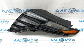 Left Hyundai Tucson 22-26 LED Daytime Running Light (DRL) assembly, gray, broken mounts