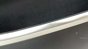 Right rear center console side trim for Hyundai Tucson 2022-2026, black with gray and chrome, type 1, scratches, whitened plastic