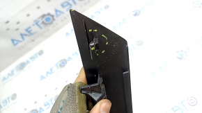 The rear right side door trim for a 19-26 VW Jetta has a broken mount.