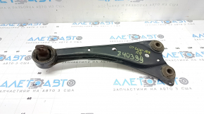 The rear right longitudinal control arm of a Lexus CT200h 11-17 has a cracked silent block.
