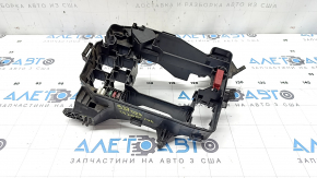 The fuse box housing under the hood of a Lexus CT200h 11-17 has a broken mount.