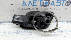 VW Jetta 19-26 fuel filler door with housing, broken latch