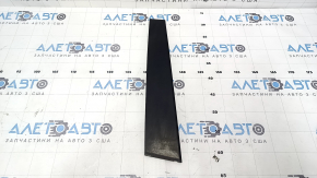The front right side door trim for a Toyota Camry V50 12-14 USA has a broken mount.