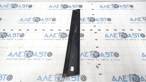 The front right side door trim for a Toyota Camry V50 12-14 USA has a broken mount.