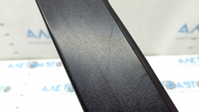 The rear right side door trim for a Lexus CT200h 11-17 has a broken mount.