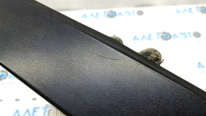 The rear right side door trim for a Lexus CT200h 11-17 has a broken mount.