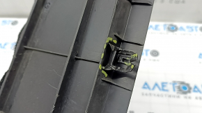The lower radiator deflector of the Lexus CT200h 14-17 is broken and the fasteners are dented.