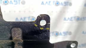 The front left fender liner of a Lexus CT200h 15-17 has torn fasteners.