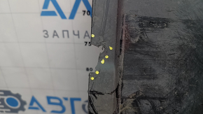 Left underbody protection for VW Jetta 19-26 is worn, dented, and the fastening is broken.