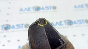 The front left outer door handle plug for an Audi Q3 83A 19-25 has a broken mount.