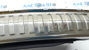 Audi Q3 83A 19-25 trunk opening trim, black with chrome, scuffs on chrome, bump