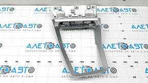 The center console trim for the Audi Q3 83A 19-25 is gray and has scratches and peeling paint.