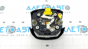 The Audi Q3 83A 19-25 steering wheel airbag is black, with peeling chrome and scratches.