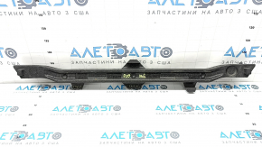 The front bumper absorber of the Audi Q3 83A 19-25 has broken fasteners and is dented.
