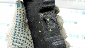 The front bumper absorber of the Audi Q3 83A 19-25 has broken fasteners and is dented.