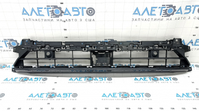 The lower grille of the front bumper of the Audi Q3 83A 19-23 for parking sensors and radar, S-Line, is broken, cracked, a fragment is missing