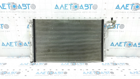 The air conditioning condenser radiator of the Hyundai Elantra 21-26 2.0 is bent, crushed, and the honeycombs are falling out.