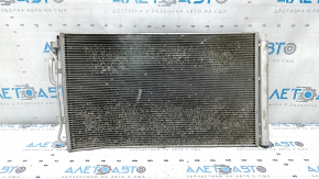 The air conditioning condenser radiator of the Hyundai Elantra 21-26 2.0 is bent, crushed, and the honeycombs are falling out.
