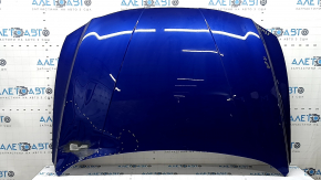 The bare hood of a Hyundai Elantra 21-23, steel, T2G graphite, sand, and chips.