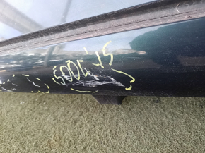 The metal roof of a Fiat 500L 14-19 is sawn off, dents, scratches
