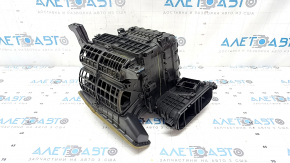 The bare heater housing of a Hyundai Elantra 21-23 without a fan or actuator.