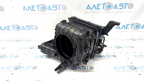 The bare heater housing of a Hyundai Elantra 21-23 without a fan or actuator.