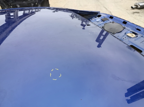 Metal roof of a 2021-26 Hyundai Elantra without a sunroof, with dents and bumps on the body.