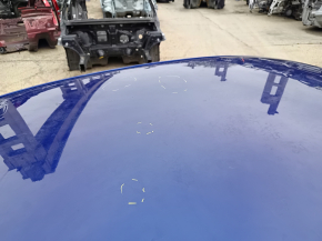 Metal roof of a 2021-26 Hyundai Elantra without a sunroof, with dents and bumps on the body.