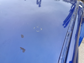 Metal roof of a 2021-26 Hyundai Elantra without a sunroof, with dents and bumps on the body.