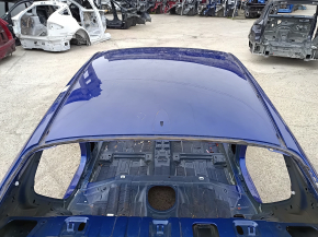 Metal roof of a 2021-26 Hyundai Elantra without a sunroof, with dents and bumps on the body.
