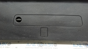 The lower trim panel of the Audi Q7 16-26 black trunk door, scratches