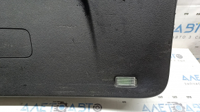 The lower trim panel of the Audi Q7 16-26 black trunk door, scratches