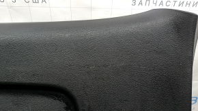 The lower trim panel of the Audi Q7 16-26 black trunk door, scratches