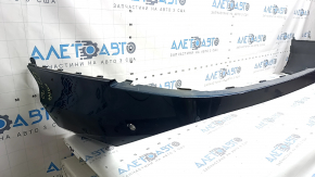 The bare lower rear bumper of the Audi Q7 20-26 for parking sensors, blue