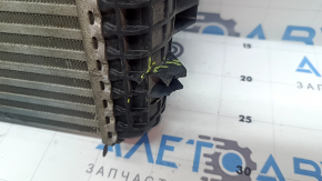 Right intercooler Audi Q7 20-26 3.0T MHEV, broken mount, dented honeycomb, dented