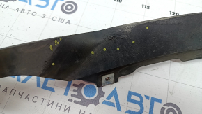 The front left fender flare on an Audi Q7 16-26 is worn out.