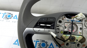 Naked steering wheel for a Hyundai Elantra 21-23 with black tires.