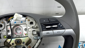 Naked steering wheel for a Hyundai Elantra 21-23 with black tires.